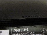 Цифровая фоторамка Philips 7FF3FPB/00 /экран 7" (480x234) /яркость 200 кд/м2 /контраст 300:1 /формат 16:9 /USB, таймер, часы, будильник, календарь